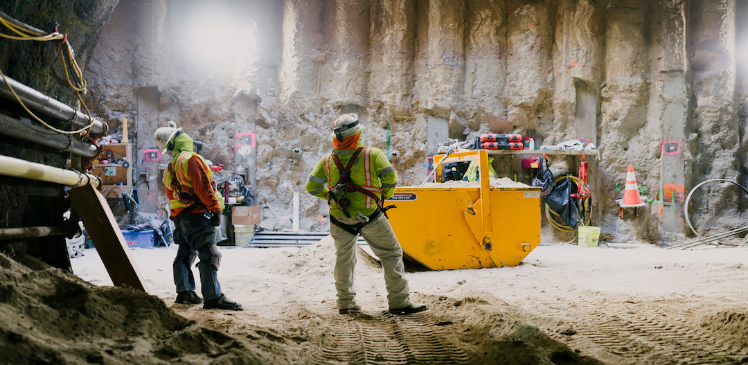 construction workers in cave