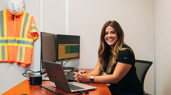 Woman sitting at desk.
