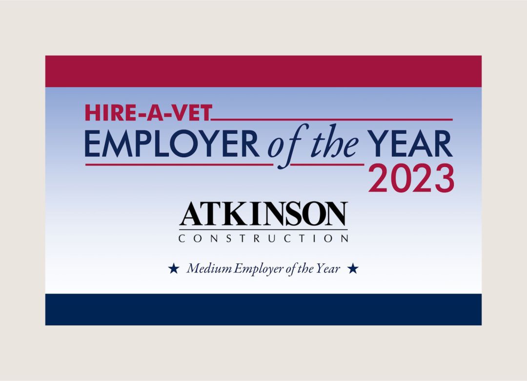 Hire-a-Vet Employer of the year 2023 Atkinson Construction Medium Employer of the Year graphic with red stripe on top and blue stripe on bottom 