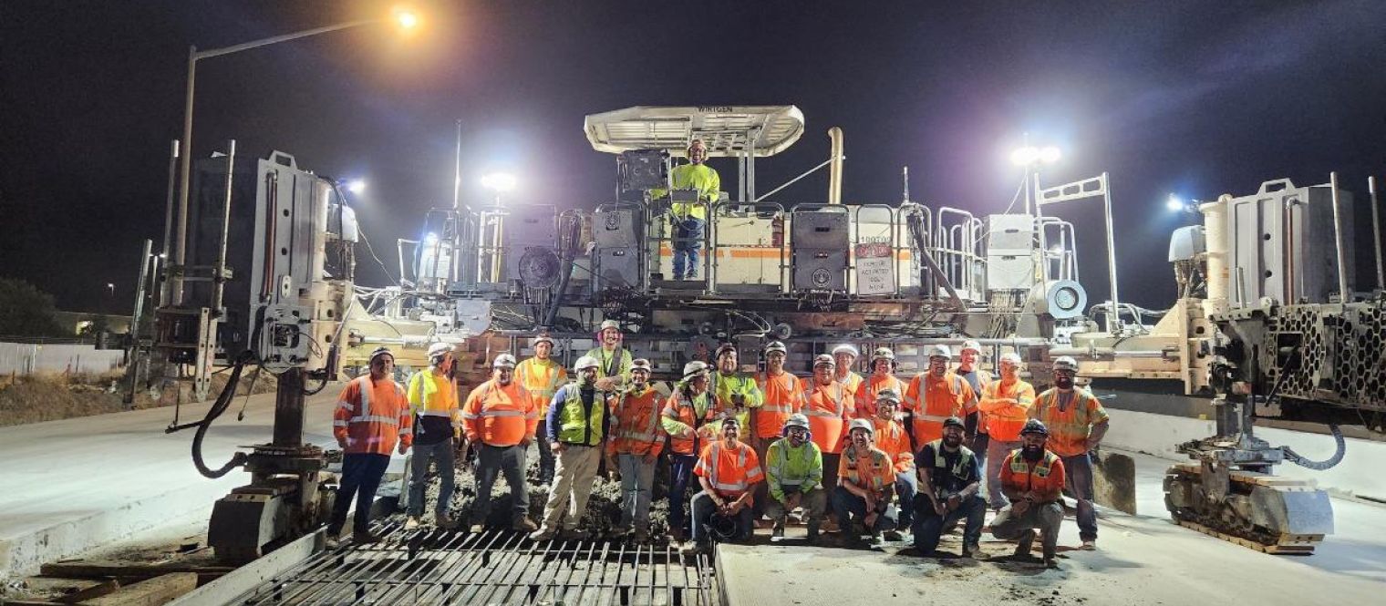 group of construction workers on bridge