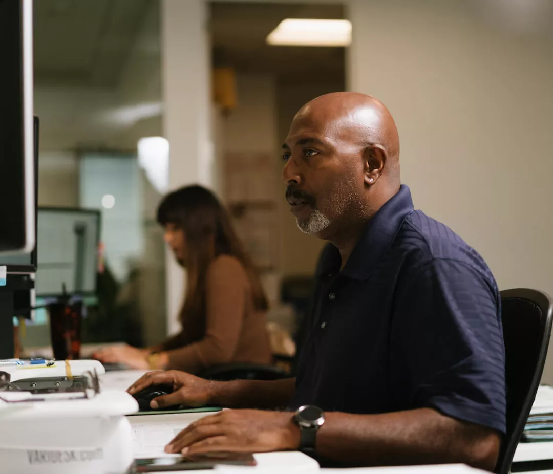 man at desk