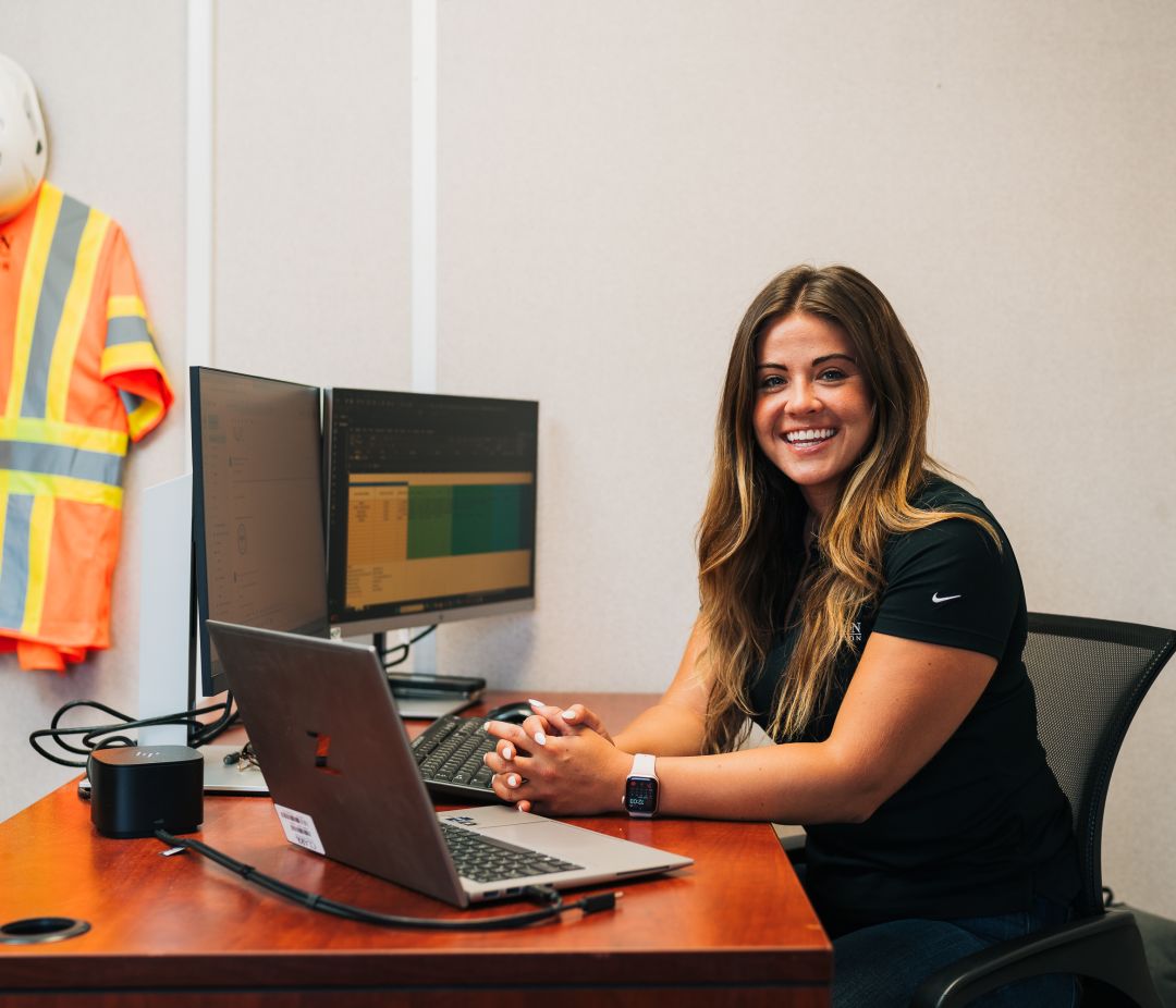 Woman sitting at desk.