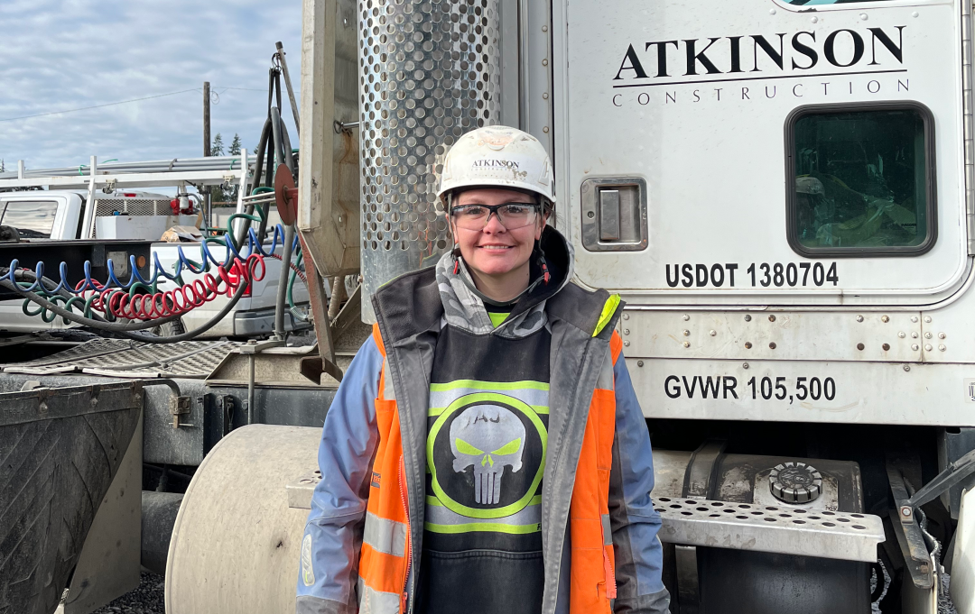 Elizabeth Lyall in front of Atkinson Truck 